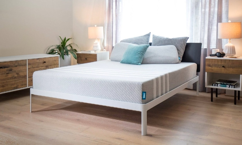 Leesa Mattress review - Leesa Mattress with pillows and lamp in a room - BedTester.com