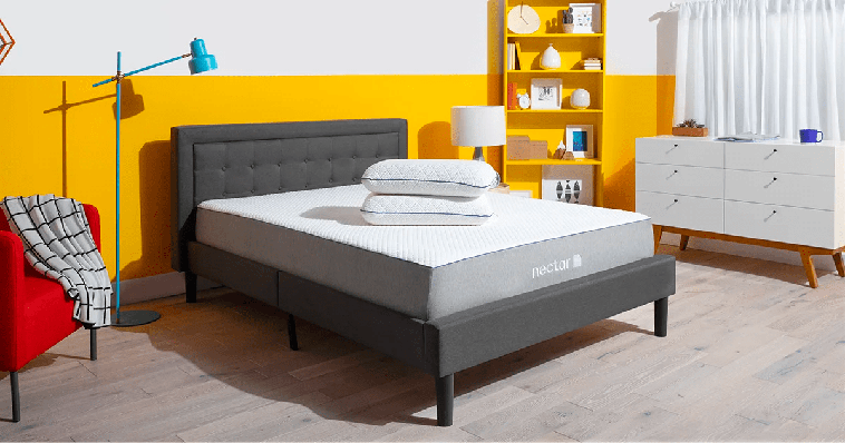 Nectar mattress on simple gray bed frame for sleep apnea.
